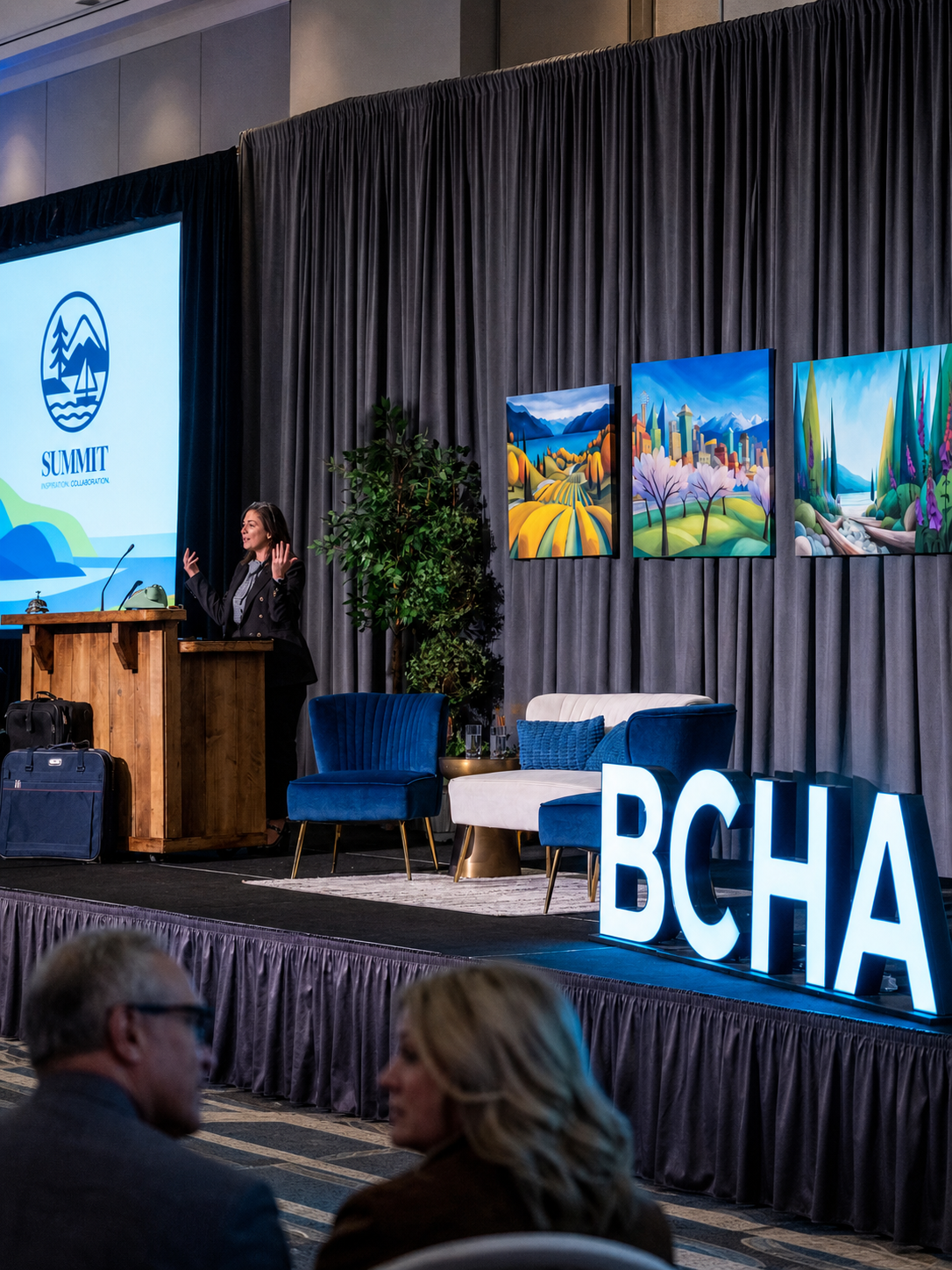 Custom British Columbia landscape artwork by Haute Curations featured on stage at the 2026 BCHA Industry Summit.