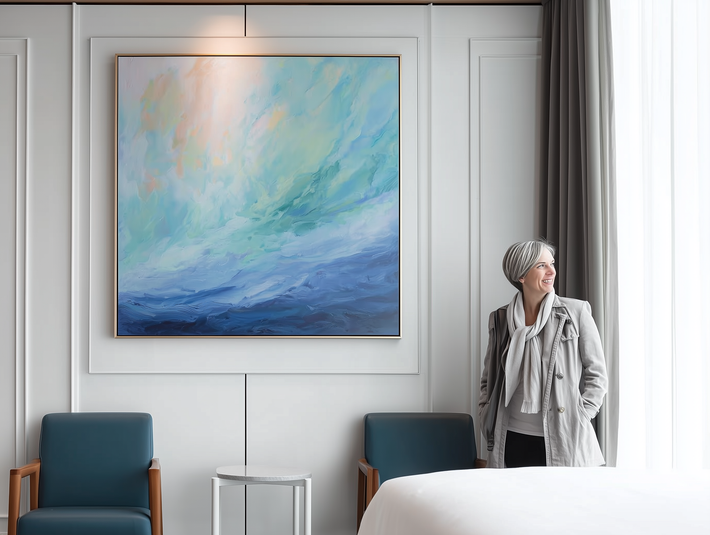 A sophisticated vertical abstract painting in a sunlit room, demonstrating environmental psychology and wellness-driven art for healthcare, senior living, and hospitality interiors designed by Canadian brand Haute Curations